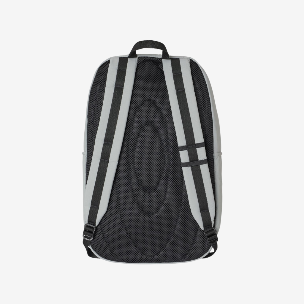 Back view of Oakley 22L Sport Backpack in Stone Grey color with padded straps and breathable back panel