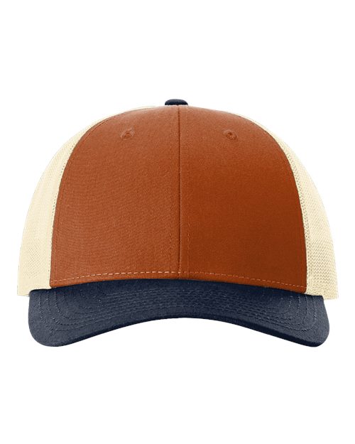 Richardson 115 structured six-panel low-profile trucker cap featuring dark orange fabric front panel, birch breathable mesh middle section, patriot blue adjustable snapback closure, and pre-curved visor
