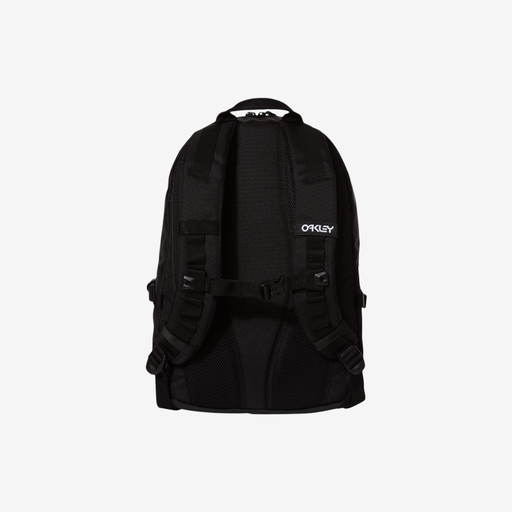 Back view of Oakley 20L Street Backpack in Blackout color featuring padded shoulder straps and breathable back panel