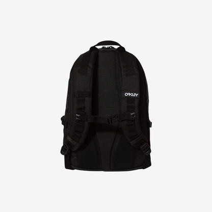 Back view of Oakley 20L Street Backpack in Blackout color featuring padded shoulder straps and breathable back panel