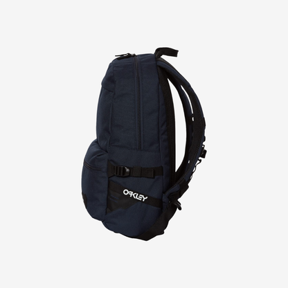 Side view of Oakley 20L Street Backpack in Fathom color highlighting slim profile and functional storage