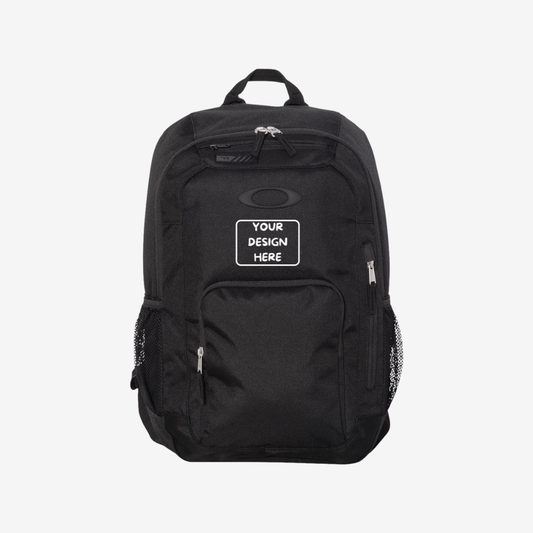 Front view of custom printed Oakley 22L Enduro backpack in Blackout color showing large logo printing area for branding and promotional use