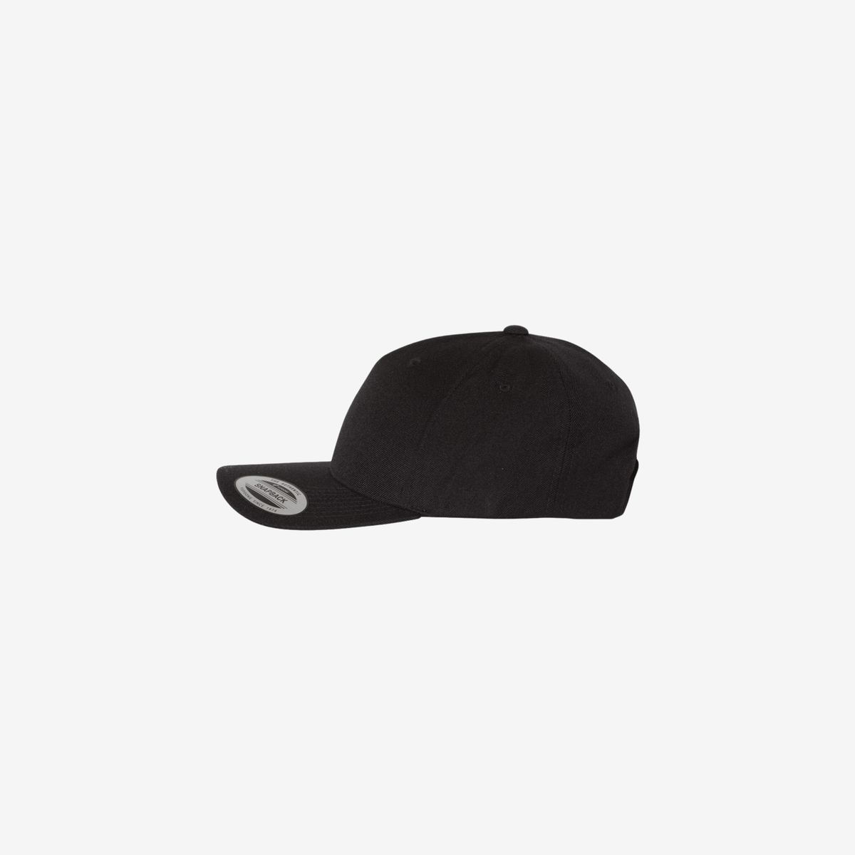 Side view of Black YP Classics 5789M premium five-panel snapback cap showing the structured mid-profile crown and curved bill